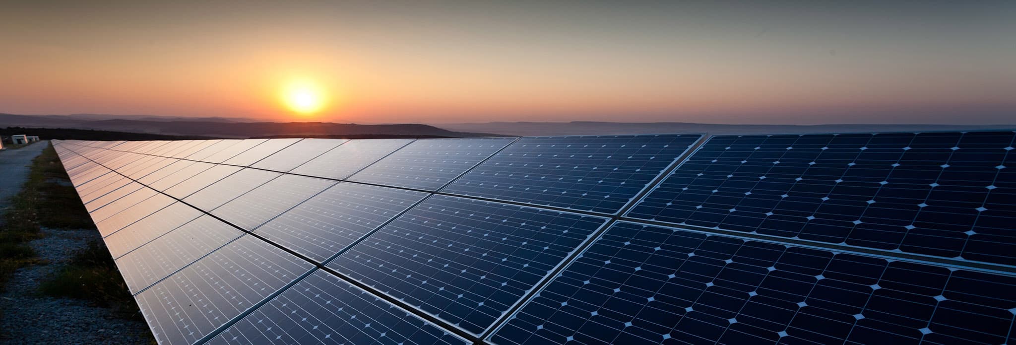 Solar farm at sunset — a growing source of demand for high-purity glass minerals