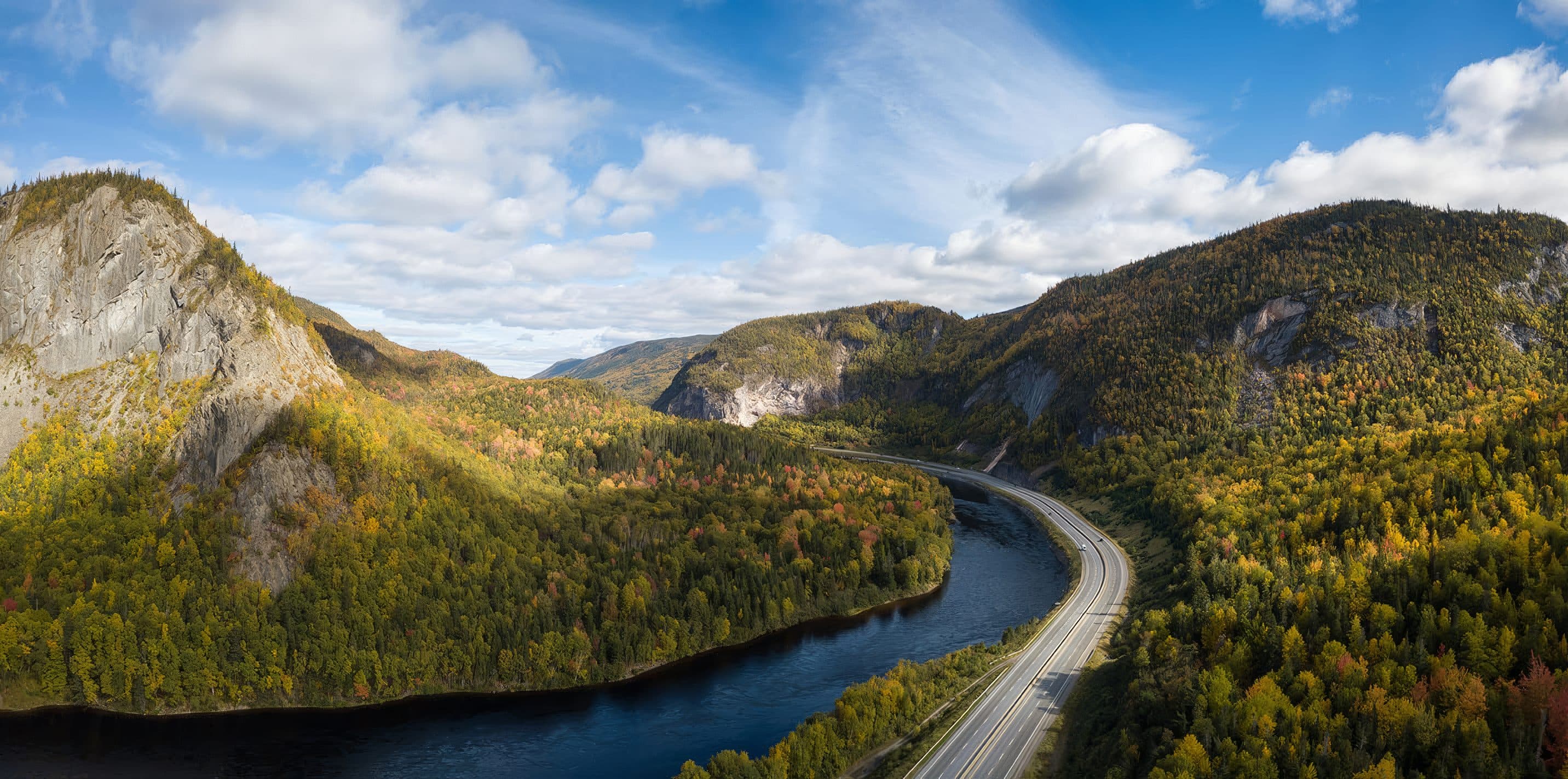Highway winding through a Newfoundland river valley