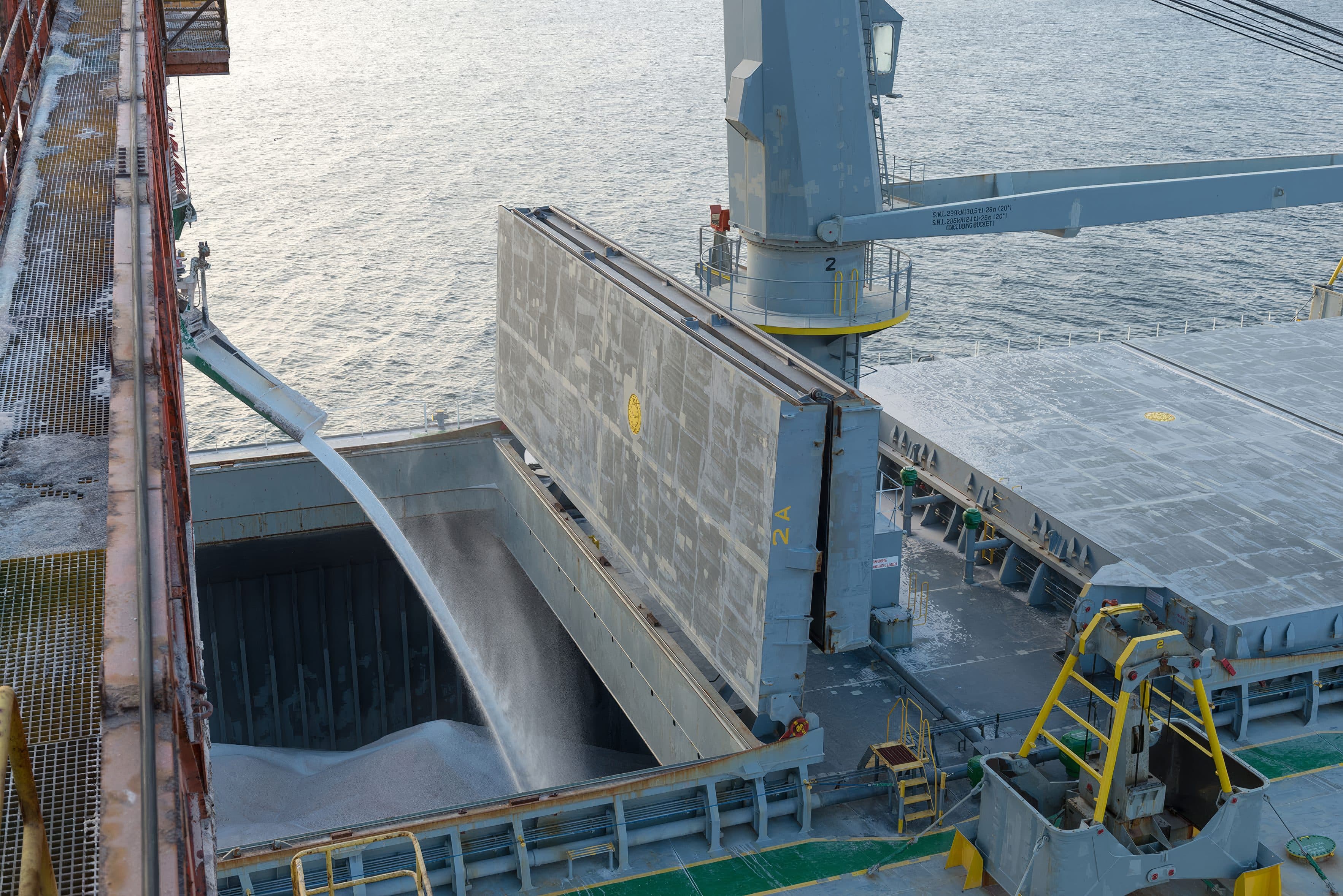Bulk carrier being loaded with salt at port